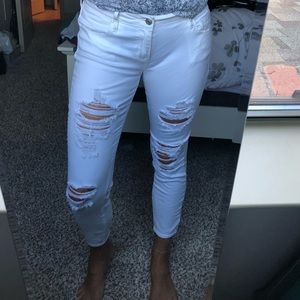 White ripped jeans